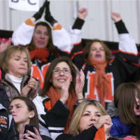 <p>Mamaroneck parents and fans cheer on their team.</p>
