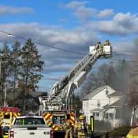 <p>Firefighters on the scene of a fire on Sitnick Avenue in Chicopee</p>