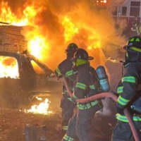 <p>Crews working on a vehicle fire on Route 25 in Wareham on Tuesday, March 21</p>