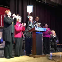 <p>Rockland County Executive Ed Day displays the law banning tobacco sales in pharmacies at Tappen Zee High School in Orangeburg Friday.  With him are, from left: Legislators Nancy Low-Hogan, Harriet Cornell, Toney Earl and Aney Paul.</p>