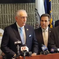 <p>Westchester County District Attorney Anthony Scarpino, Jr. announcing the arrests of a dozen gang members who were arrested in Yonkers.</p>