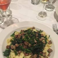 <p>Crumbled sausage and broccoli rabe that one Yelp reviewer said were done to perfection and ladled over a pile of orecchiette pasta.</p>