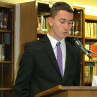 <p>A student presenter addresses the panel at the Dec. 11 civics forum at New Rochelle High School.</p>