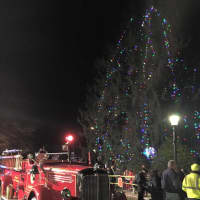 <p>Santa arrived for the Demarest tree lighting Tuesday night in his sleigh, which looked much like a fire truck, to the delight of waiting children.</p>