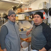 <p>Workers in the kitchen of the Oakland Diner are preparing for the diner to reopen this week.</p>