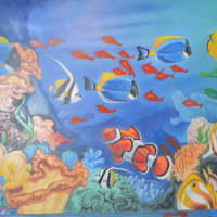 <p>The walls of the redone bathrooms in the Oakland Diner have been painted with under-the-sea themed murals.</p>