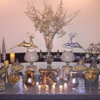 <p>An elegant gold and silver display for a Christmas party by Dive in Sweets.</p>