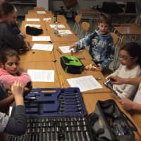 <p>Do-It-Yourself inventors disassembled and reassembled a bicycle at F. E. Bellows Elementary School.</p>