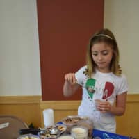 <p>Dows Lane Elementary School students took their classmates and parents on an adventure to different countries around the world by letting them sample a variety of authentic food dishes during the annual Country Celebration.</p>