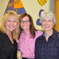 <p>From left, third-grade teachers Joan Burns, Mary Lynn Child and Kathleen Deuel at Dows Lane Elementary School’s Family Math Night on Oct. 21.</p>