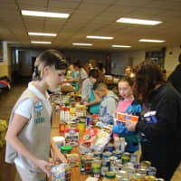 <p>Leonia Scouts assisted with the annual food collections program at the local pantry. </p>