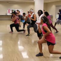 <p>Instructor Diana Ruiz leads the class through its paces.</p>