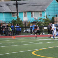 <p>Junior Aviator Anthony Dilascio outruns North Arlington defenders on the way to the end zone for the first of his four touchdowns on the day.</p>