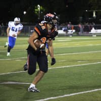 <p>Hasbrouck Heights tight end Phil Miller picked up big yardage on this play in the second quarter.</p>