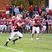 <p>Pompton Lakes quarterback Kevin Cotter looks down field late in the game needing a score to re-take the lead against Hasbrouck Heights.</p>