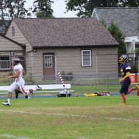 <p>The Aviator quarterback heads to the end zone in the second quarter.</p>