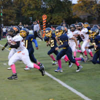 <p>Pee Wee Aviator Nick  Grasso heads to the end zone in the second quarter of the game against Saddle Brook.</p>