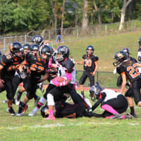 <p>Manchester running back Troy Leary Jr. tries to break through Hasbrouck Heights line.</p>