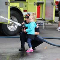 <p>Children could put out a &quot;fire&quot; with the help of Hasbrouck Heights Fire Department.</p>