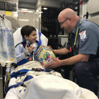 <p>James, age 6 and Pete Kessler, President of the Stamford Paramedic Association, Local R-1 684, a unit of IAEP</p>