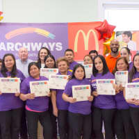 <p>McDonald&#x27;s graduates and their diplomas at the Hackensack YMCA.</p>