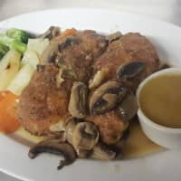 <p>E&amp;V Ristorante&#x27;s &quot;famous&quot; stuffed chicken with brocolli rabe and mushrooms.</p>