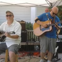 <p>Eric Pooley and his Goat Rodeo Band perform at Family Fun Day.</p>
