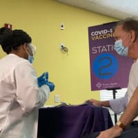 <p>Connecticut Gov. Ned Lamont receiving his first dose of the COVID-19 vaccine.</p>