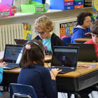 <p>Students at F. E. Bellows Elementary School during an &quot;Hour of Code&quot; last week.</p>