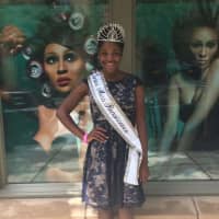 <p>Mount Vernon native Atiera Hopkins after winning the Miss Renaissance Pageant 2013 in Georgia.</p>