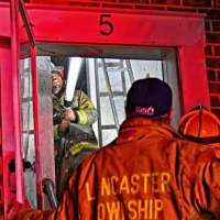 <p>Firefighters at a house fire in the first block of Pickford Drive.</p>