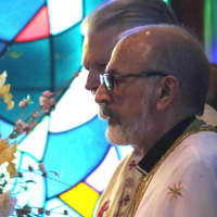 <p>The Very Rev. Fr. Joseph J. Allen on the altar at St. Anthony&#x27;s.</p>