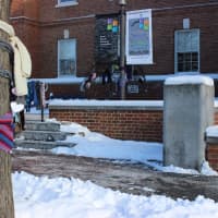 <p>Members of the Purls of Wisdom Knitting Group and the Sewing Salon gave away hundreds of free scarves, hats and mittens in the second annual Yarn Bombing at Fairfield Public Library.</p>