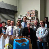<p>Senator Bob Duff, Representative Fred Wilms, P2P Executive Director Ceci Maher and Mayor Harry Rilling joined FactSet volunteers to help with distribution.</p>