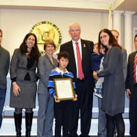 <p>Fair Lawn Mayor John Cosgrove is flanked by David Rosenblum, holding the borough&#x27;s proclamation on Congenital Heart Defect Awareness Week, and Grayson Pohlman and his mom Gabrielle.</p>