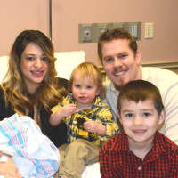 <p>Dana and Kyle Swensen of Midland Park with their sons Jalen, 6, Kamden, 18 months, and baby Milan Evee Belle.</p>