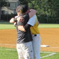 <p>Trevor (right) hugs his father after Cresskill&#x27;s state tournament loss to Waldwick</p>