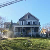<p>Natick firefighters extinguish a fire at 11A Union Street on Wednesday afternoon, Nov. 9</p>