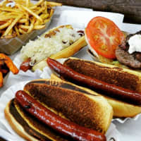 <p>Dogs are made with Black Angus beef at The Filling Station and its sister restaurant, T.F.S. Burger Works.</p>