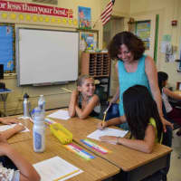 <p>Students and teachers meet on first day of school.</p>