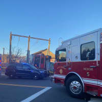 <p>New Canaan Police and Fire on the scene of the derailment.</p>