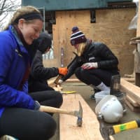 <p>Fordham University students helping Habitat for Humanity build a house in Yonkers.</p>
