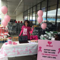 <p>Fishkill resident Dawn Fortis, a breast cancer survivor gives out pink cupcakes and bracelets in front of a local supermarket. She is raising funds for a cure for the disease that strikes 1-in-8 American women each year.</p>