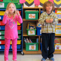 <p>Kindergarteners at Increase Miller Elementary School celebrate Valentine&#x27;s Day with a performance of &quot;Froggy&#x27;s First Kiss.&quot;</p>