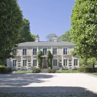 <p>The facade of 87 Valley Lane is reminiscent of a French castle.</p>