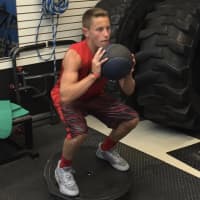 <p>Hasbrouck Heights youth athlete Justin Mucci works on balance and strength.</p>
