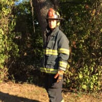 <p>Larchmont resident Robin Nesdale in all her gear. She is a volunteer with the Town of Mamaroneck Fire Department.</p>