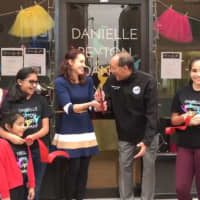 <p>Danielle Peyton and Cliffside Park Mayor Thomas Calabrese cut the ribbon on her new studio.</p>