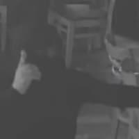 <p>Stratford police released this surveillance camera photo of the suspect in the armed robbery and shooting of a bartender at BAR on Tuesday night.</p>