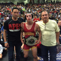 <p>Bergen Catholic&#x27;s Nick Suriano with coach Damion Logan, left, and his father, Bob Suriano.</p>